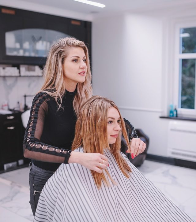 hairstylist-client-taking-salon